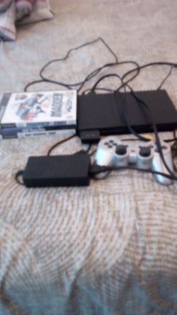 PlayStation 2 Slim Black with 1 Controller, 3 Games, Connections and 1 Memory Card.