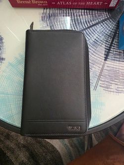 Tumi  passport zip around