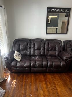 Dark Brown Leather Reclining Sofa and loveseat
