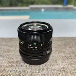 Canon 50mm F/1.4 FD Mount Lens + Adapter to SONY NEX