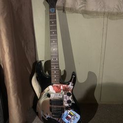 Small Collection Of Guitars