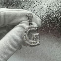 A Moissanite Initial in Sterling Silver with a CTW of 2.31 in Bugget Style