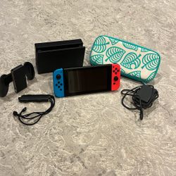 Nintendo Switch with all accessories and case