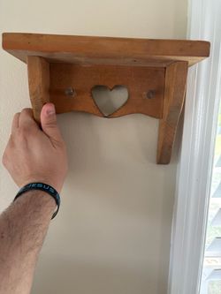 Wood shelf with heart cutout