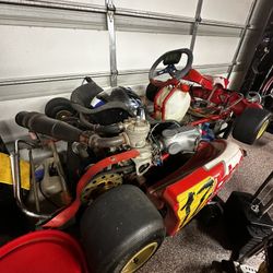 This is a Birel R30 chassis racing kart And Stand 