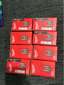 Milwaukee M12 REDLITHIUM 3.0Ah compact battery packs.