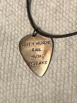 Stamped Metal Guitar Pick Necklace