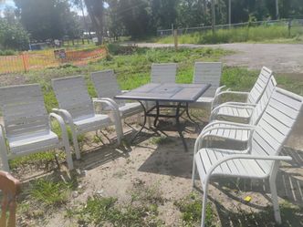 Patio table with eight chairs 50 bucks 50 bucks delivery in description
