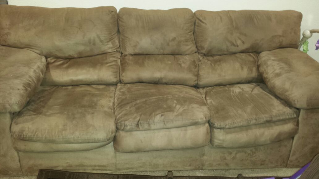 Tan microfiber couch/sofa.