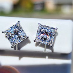 4 Carat Princess Cut Moissanite 18kt White Gold Plated Sterling Silver Stud Earrings.