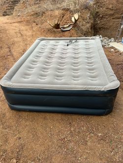 Extra tall Queen size airbed with electric pump.