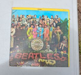 The Beatles Sgt. Pepper's Lonely Hearts Club Band vinyl record album.