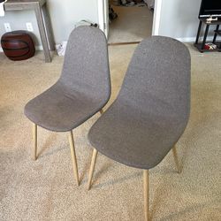 2 grey dining chairs