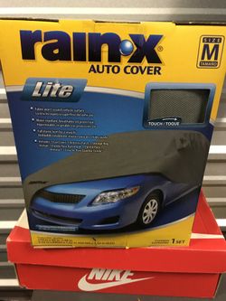 Brand new in box rain x auto cover size M