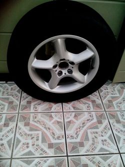Bmw...1 tire with rim..235/65/R17..like new