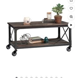 Sauder Steel River Engineered Wood Coffee Table in Carbon Oak Industrial Metal Accents On Wheels