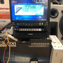 Clarion Vrx935vd With Cd Changer Center Channel Speaker and Em Satellite Receiver