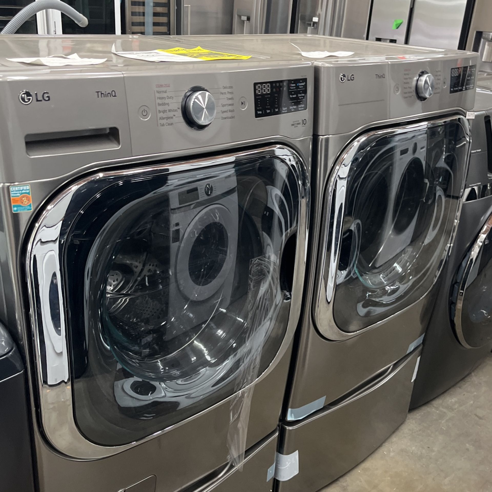 LG Set Front Load Washer 5.2 Turbo Wash And Dryer Silver New With Padestals