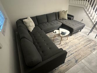 U-Shape Sofa, Rug & Small Coffee Table