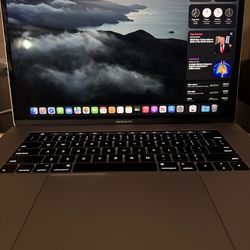 15 IN MacBook Pro With TouchBar. more Info In Description