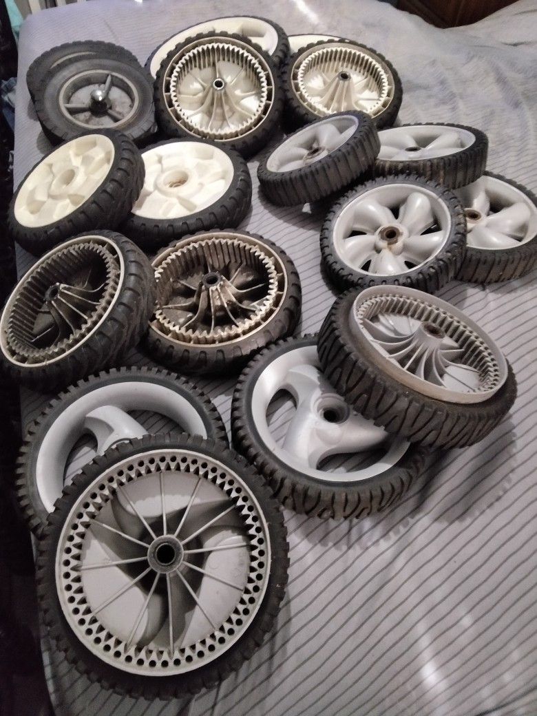 Sets Of Wheels For Lawn Mowers $40 Each Set Or $20 Each Door