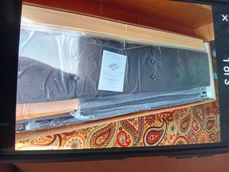 Cama queen size con el espaldar y cuatro gabetas en la parte de abajo nueva de caja.