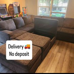 Gray large sectional L shaped with storage compartment Ottoman 
