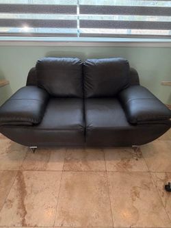 Set of dark brown Leather couches