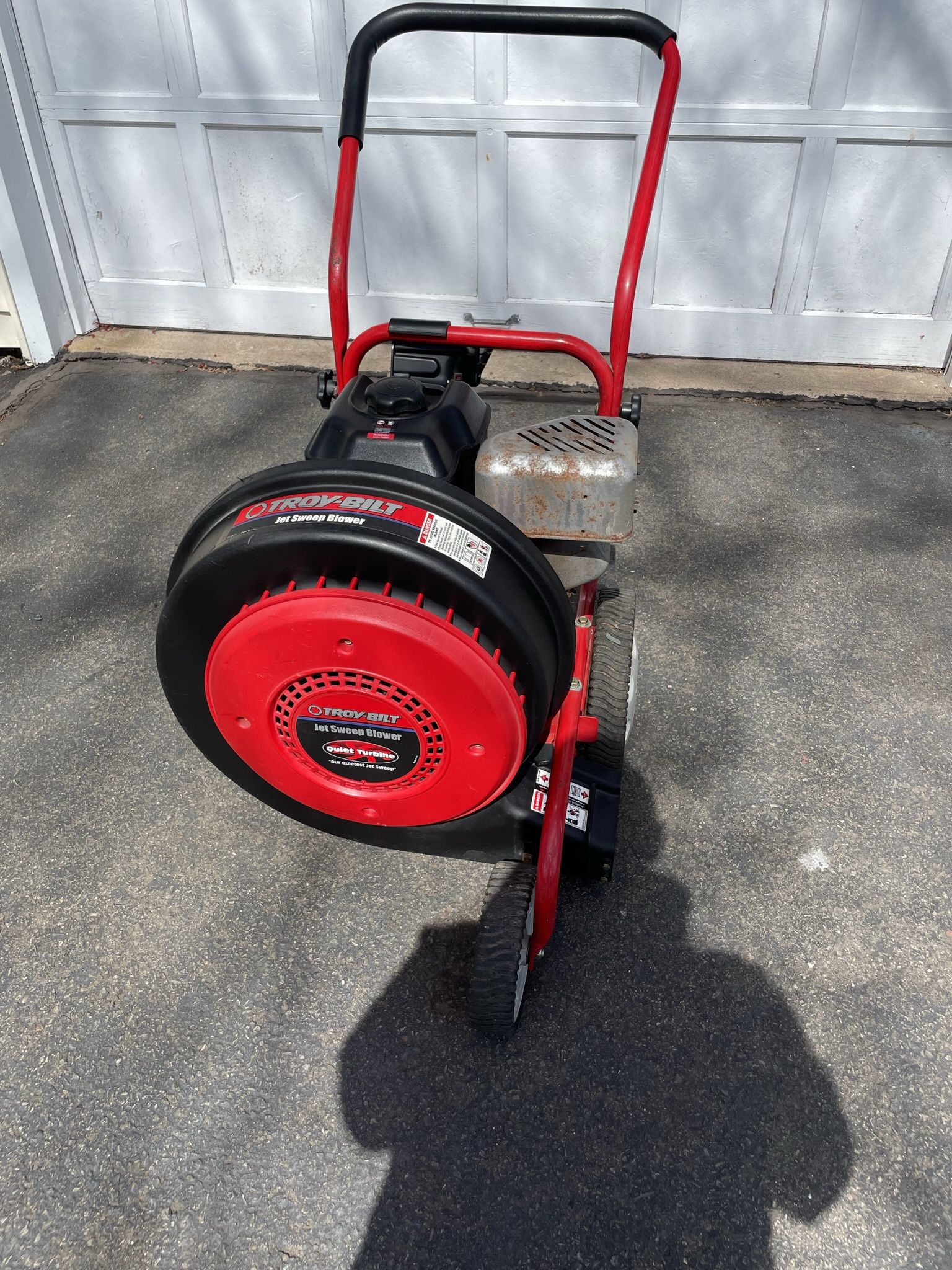Troy Bilt Jet Sweep walk behind leaf blower. In good condition. Includes directional 
