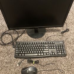 Computer Monitor, Keyboard, And Mouse