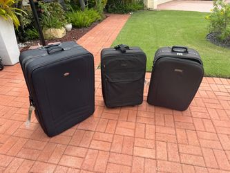 Large suitcases - $45 large - $35 medium