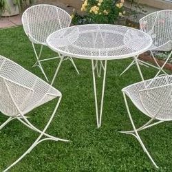 Salterini Table,Chairs and Bench Set Orange Slice Clamshell Authentic mcm mid century modern.

Table,3 chairs,1 bench
Authentic set from the original 