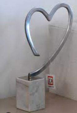 Silver Metal Heart Sculpture on Stone Base