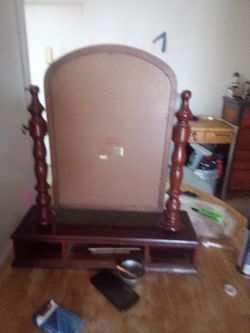 it was made by the Bombay company in 1997  swivel vanity desktop 10 brand new condition and we're asking for $70 it's originally 200 when it was made