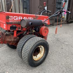 Gravely Tractor With Blower And Plow Attachments