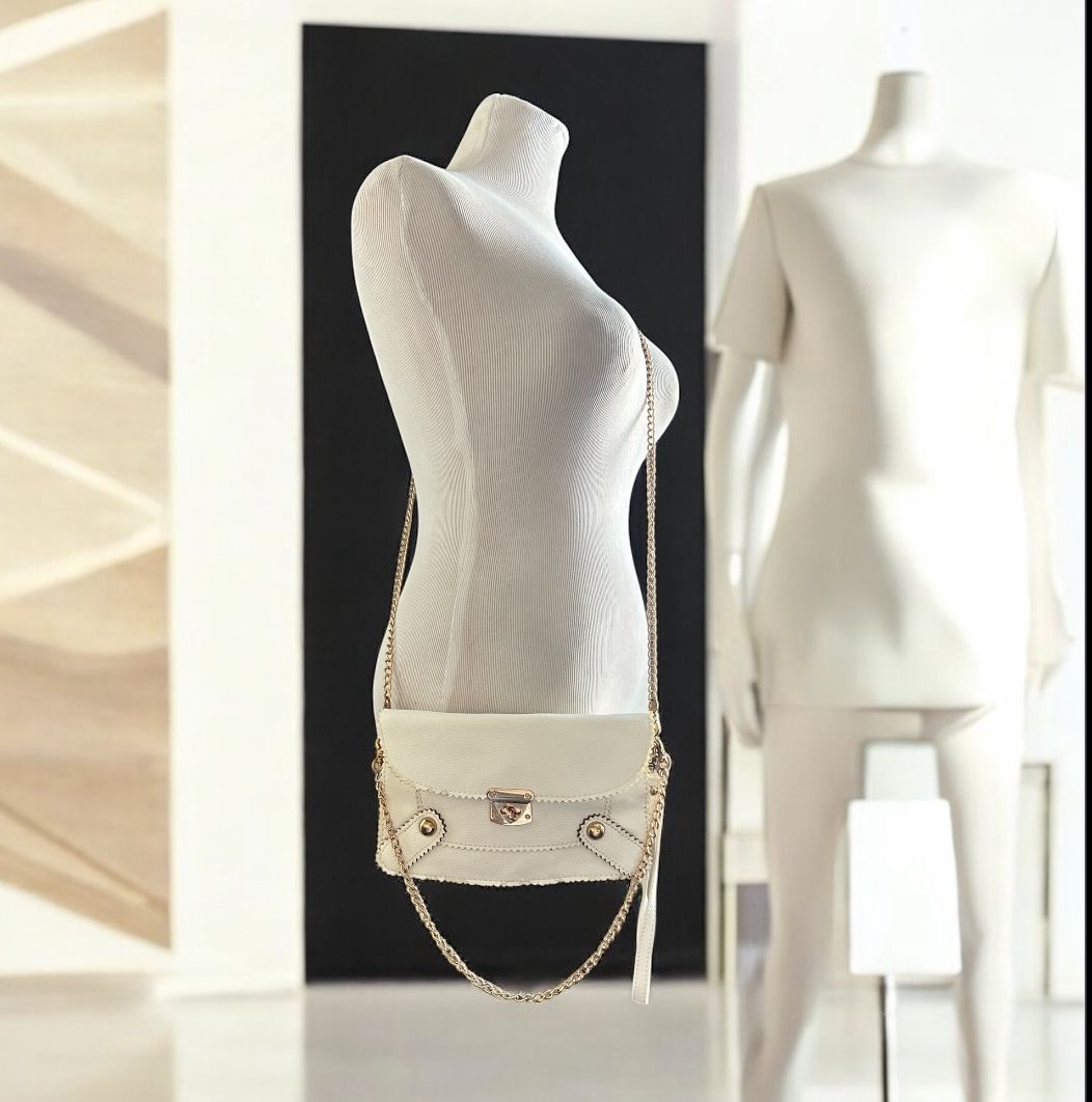 Designer ivory/white with gold chains over the shoulder or cross body leather handbag