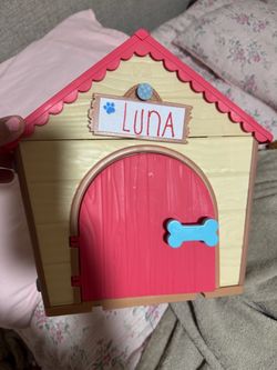 Dog house and plush toy
