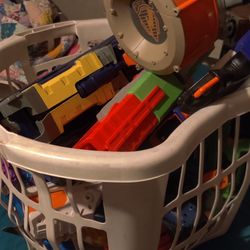 Laundry Basket Of Nerf Guns