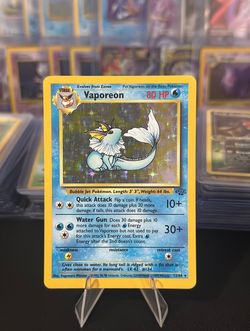 1999 Pokemon Vaporeon Holo Rare Jungle 12/64 Vintage WOTC