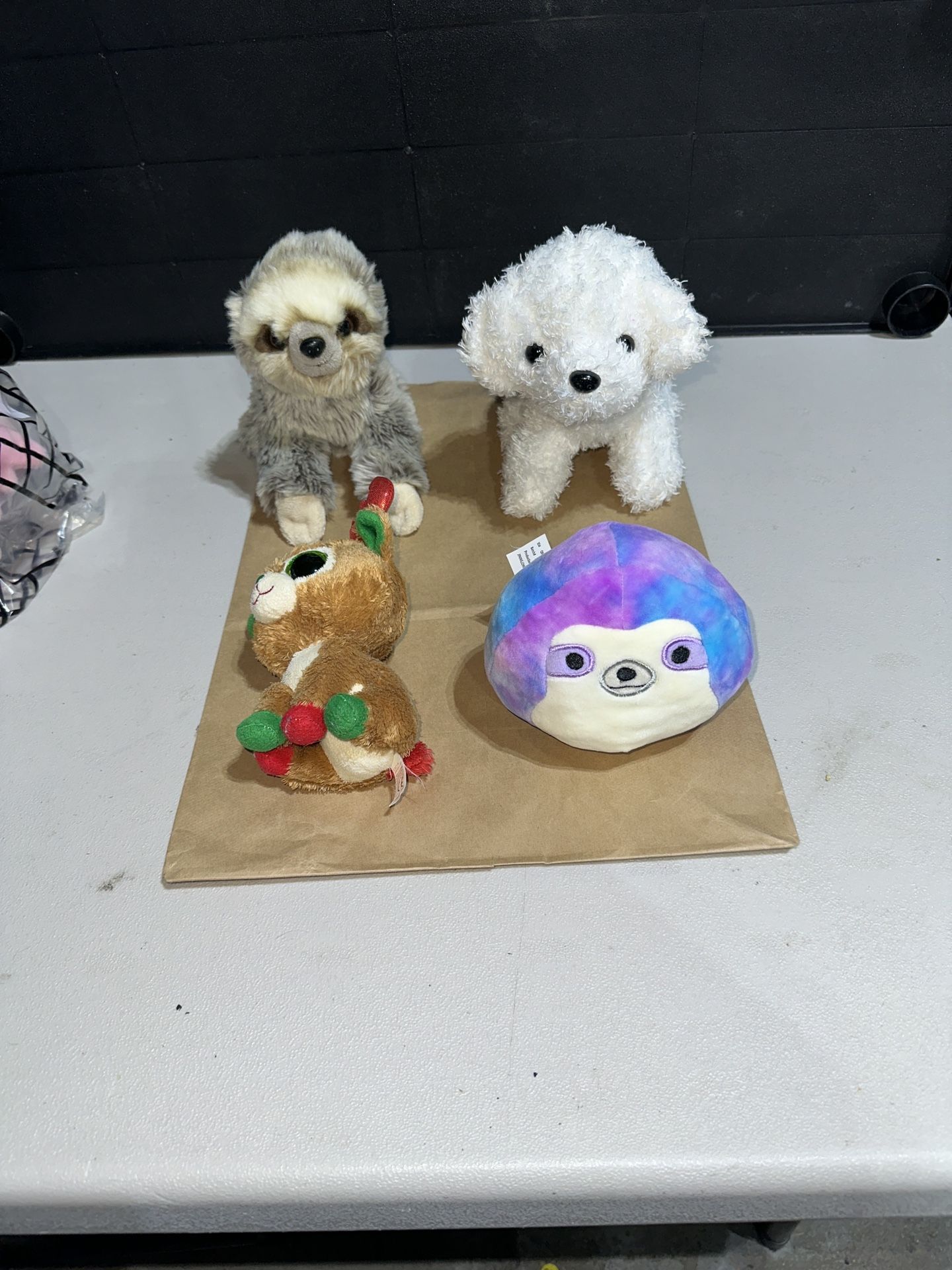 Four Various Plush Stuffed Toys