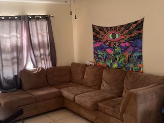 L SHAPED BROWN COUCH