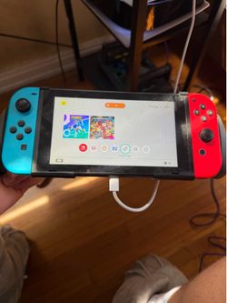 Nintendo Switch (COMES WITH 3 GAMES)