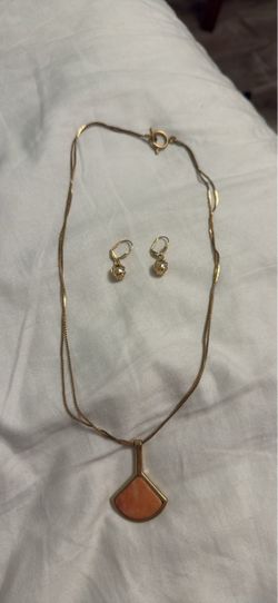 Gold toned necklace, and earrings