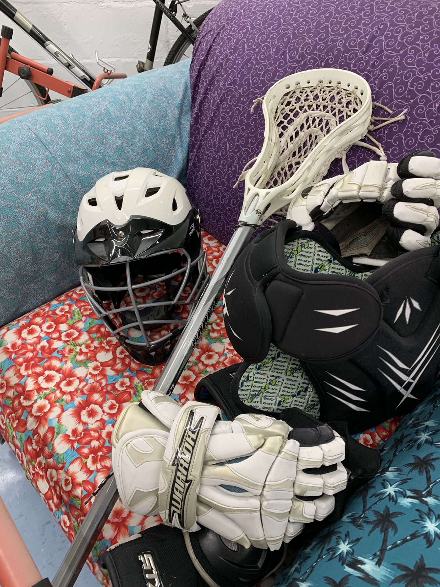 Brine Lacrosse Helmet. Warrior Lacrosse gloves.