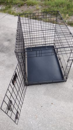Medium Sized Dog Crate 24 Inches High 30 Inches Long 21 Inches Wide