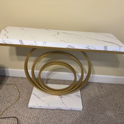 Table With Gold Rings