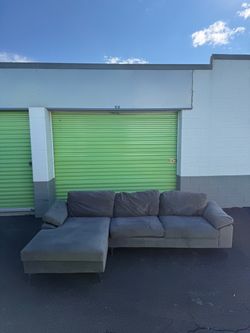 Free delivery! Grey sectional couch