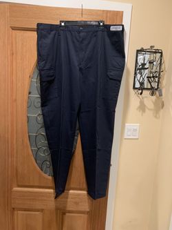 Work pants with an extra pocket on the leg. Color: blue. Size: 46. New. I have 7 of them. Price: $10 all