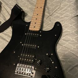 Barely used guitar( Comes With An Amp, Guitar Bag And Random Accessories)