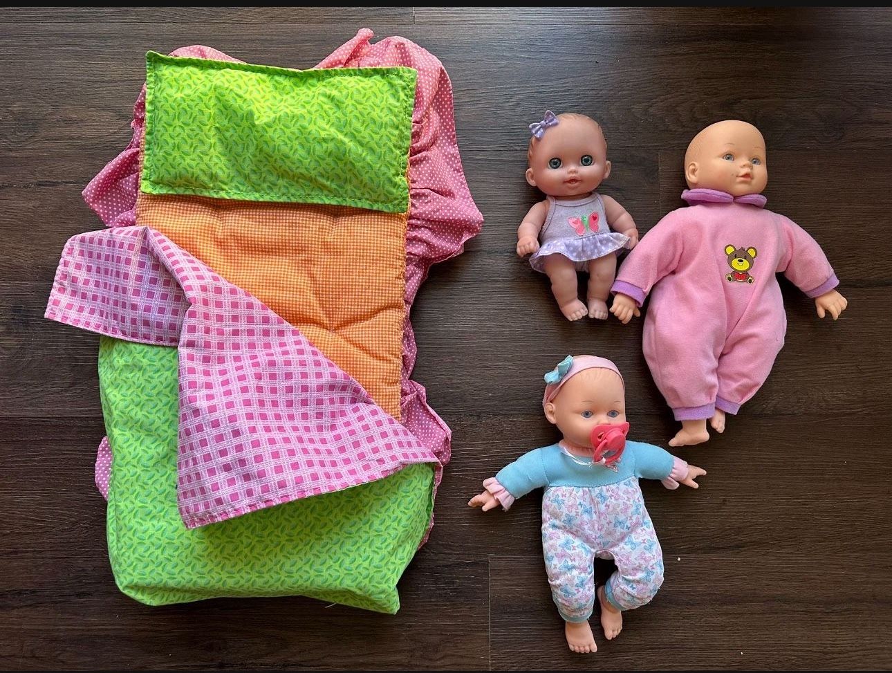 Doll Bed And Three Dolls $15 for all